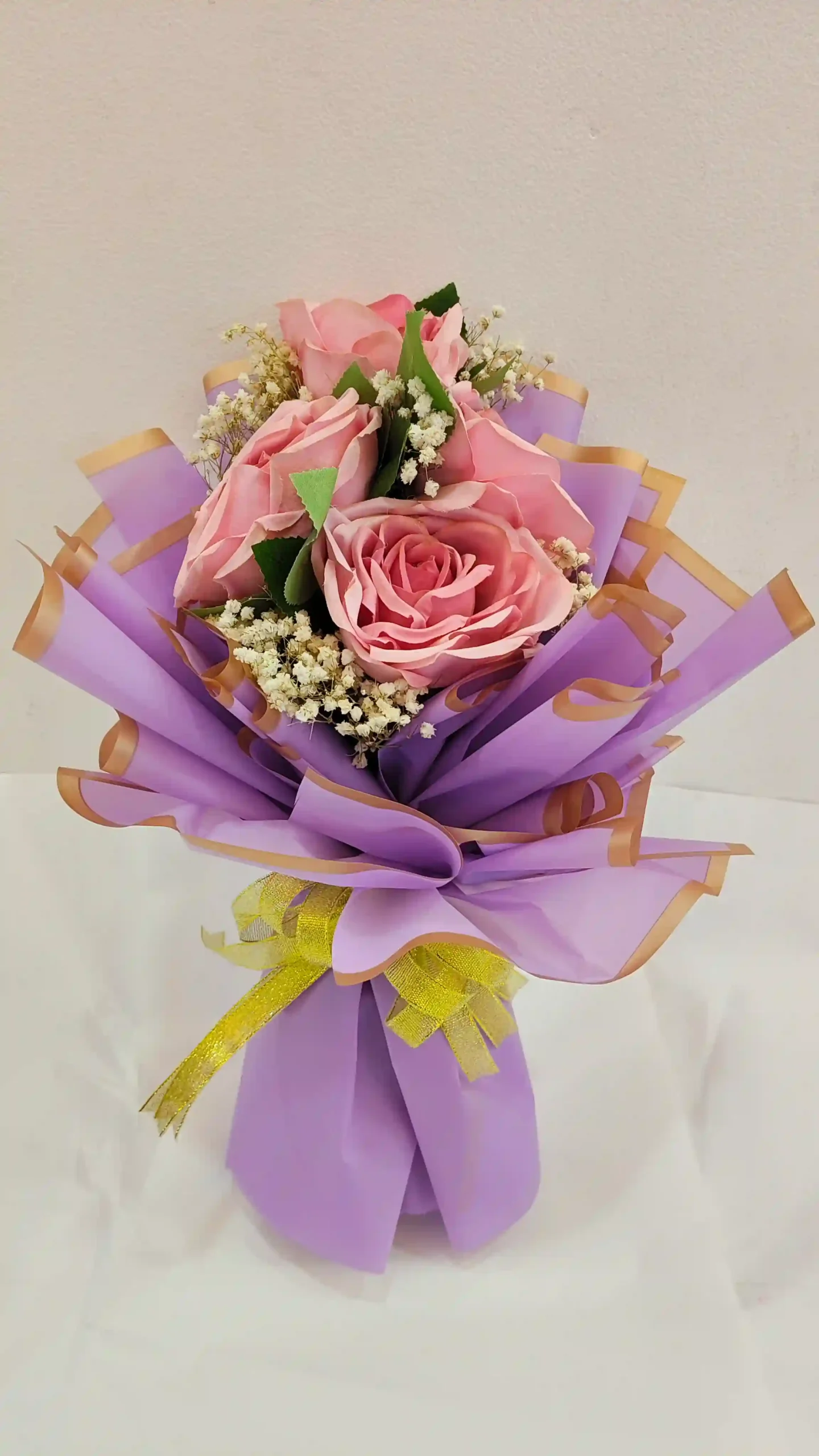 Artificial bouquet light rose .AED.60