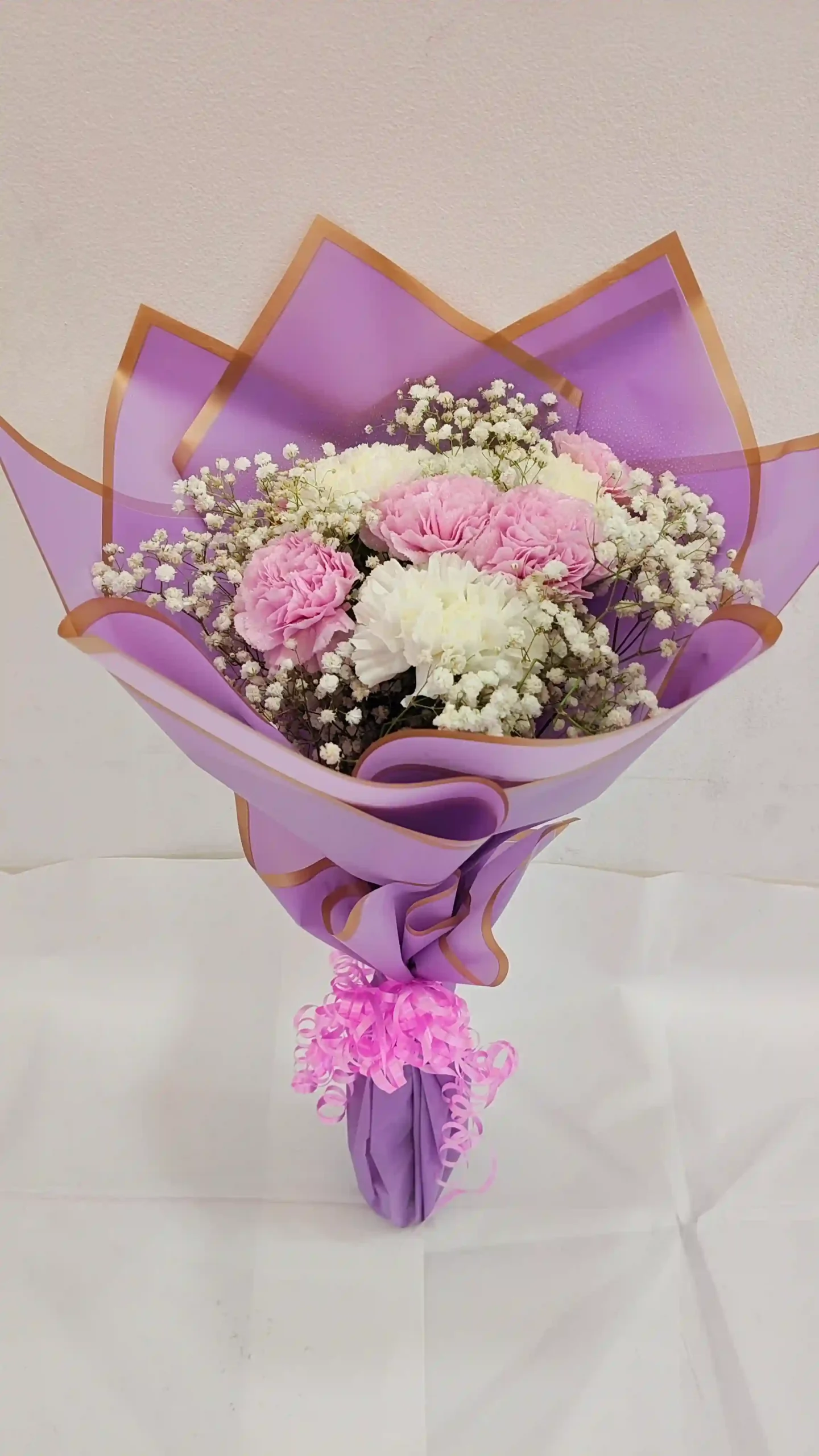Fresh flower Carnation white pink and jipso bouquet.AED.90